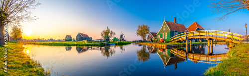 Beautiful Dutch scenery panorama of Zaanse Schans windmill village in Netherlands 