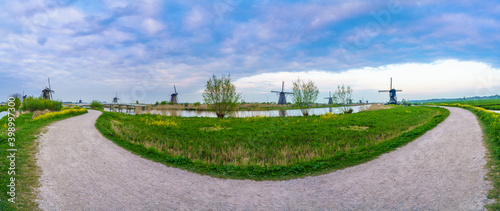 Traditional dutch scenery panorama with windmills. Netherlands countryside