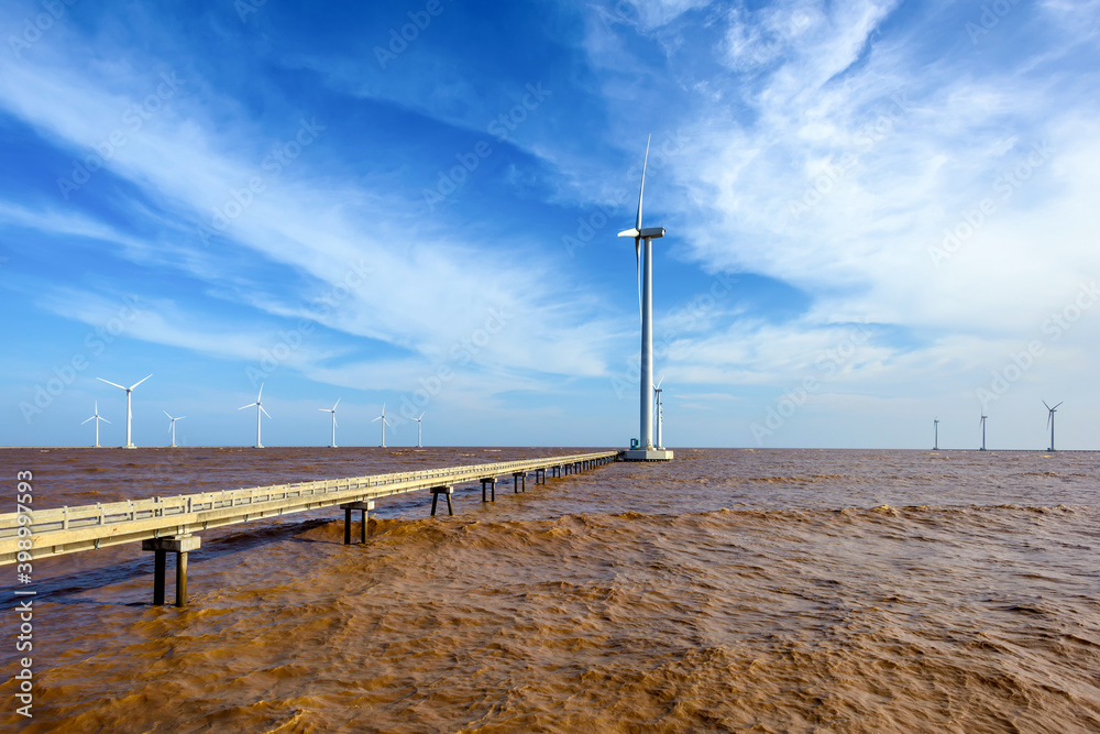Wind power turbines  at sea in Bac Lieu province, Vietnam.