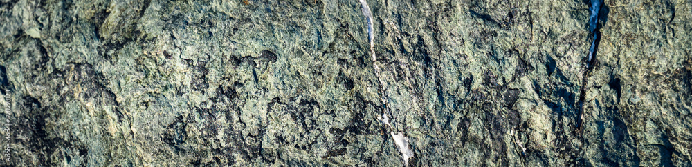 Obraz premium Closeup of blue green rock as a nature background 