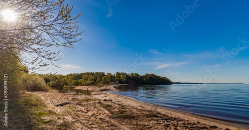 Fototapeta Naklejka Na Ścianę i Meble -  River with sandy beach in Sunny summer