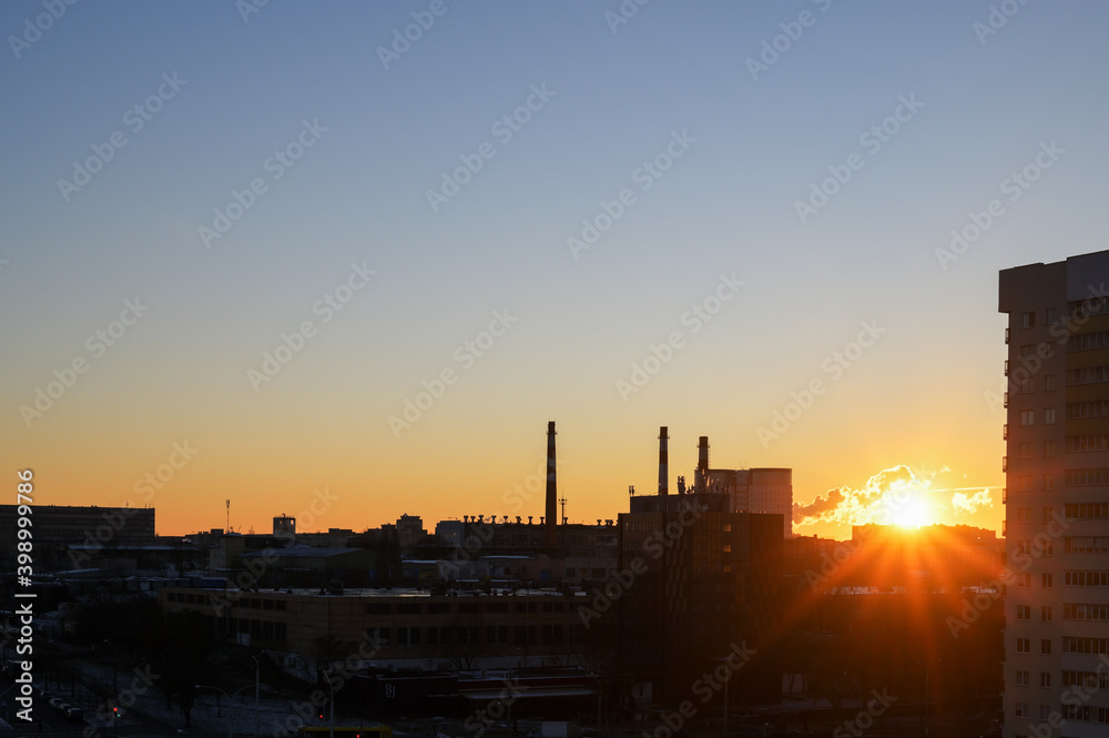 Photo of sunrise over city at night. Phoenix city lights at dusk