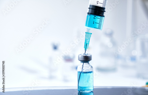 Vaccine and syringe injection. It use for prevention,immunization and treatment from corona virus infection. syringe and vials. Vaccine for coronavirus on white background.