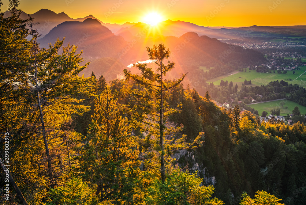 Beautiful landscape at sunset with mountain peak and trees. Schwangau in Fussen region. Southwest Bavaria. Germany 