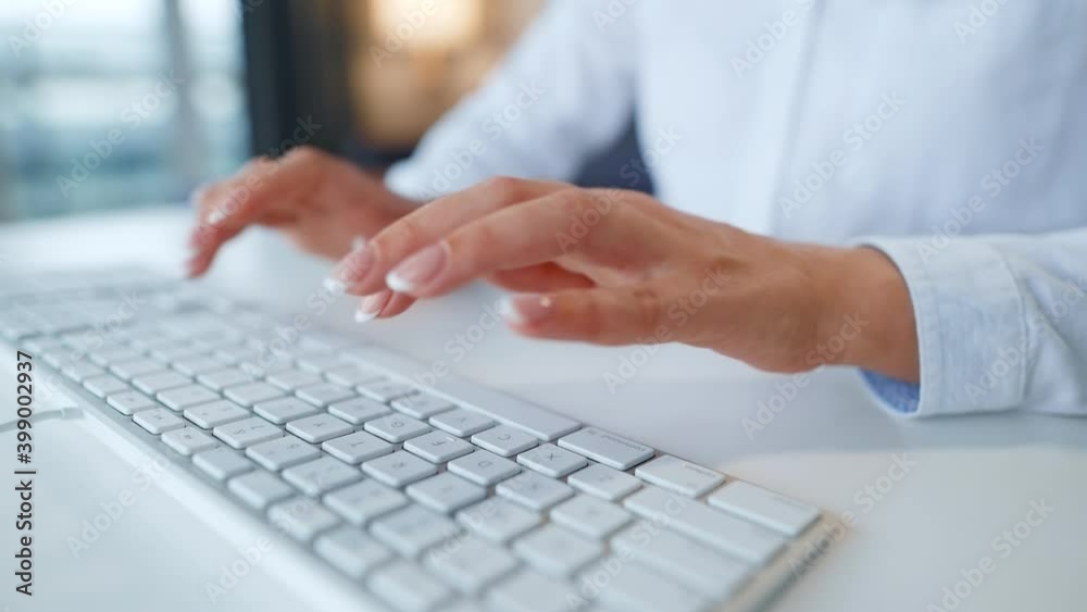 Female hands typing on a computer keyboard. Concept of remote work. Female hands typing on a computer keyboard. Concept of remote work.