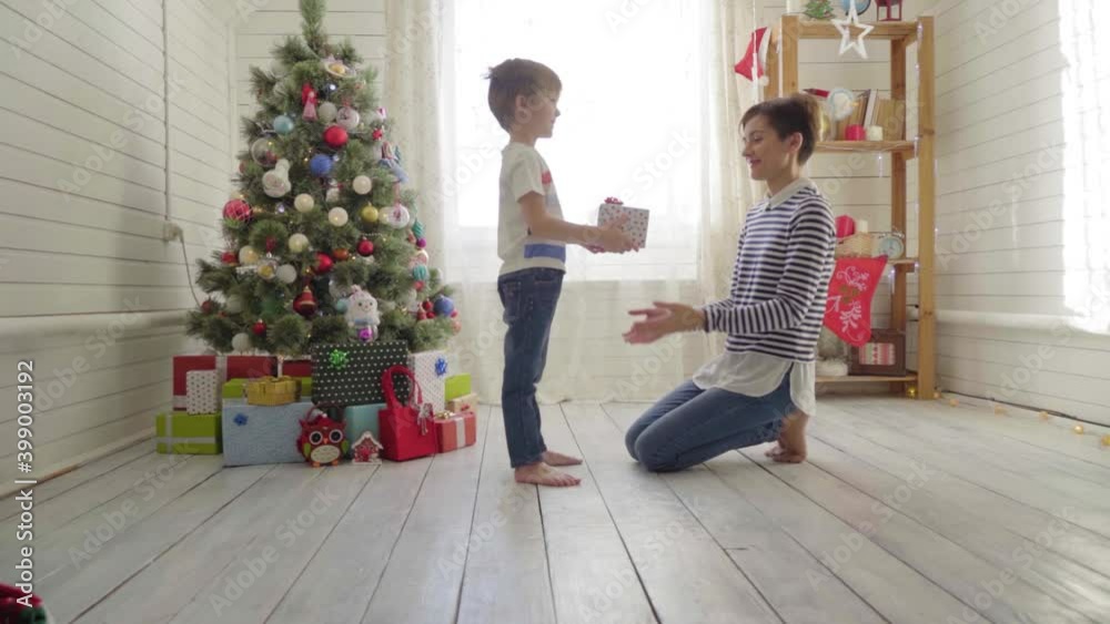 Son gives mom a Christmas present