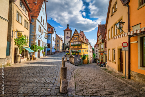 Traditional German architecture of Rothenburg ob der Tauber city with timbered houses in morning light. Bavaria, Germany