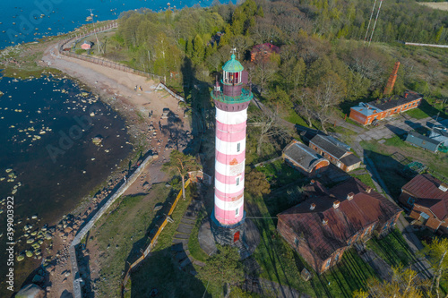 Shepelevo lighthouse close-up on a May day (shot from a quadcopter). Leningrad region, Russia photo