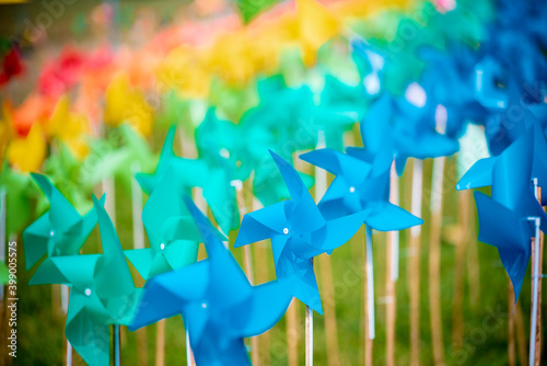 Colorful pinwheel on blur background photo