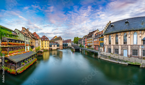 Old town architecture of Strasbourg, Alsace, France. Traditional half timbered houses near water canal of Petite France