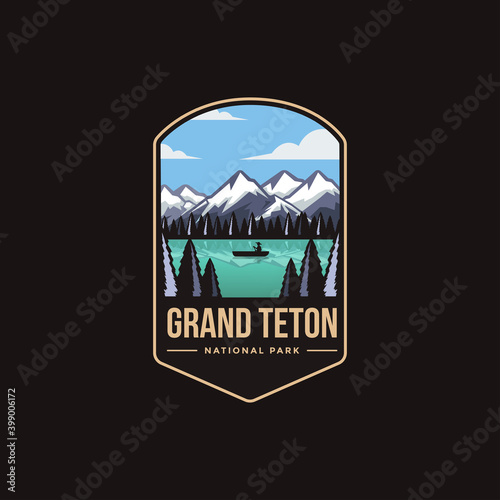 Fotografia Emblem patch logo illustration of Grand Teton National Park on dark background