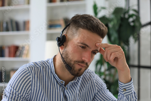 Businessman speak talk on video call with colleagues on online briefing during self isolation and quarantine.