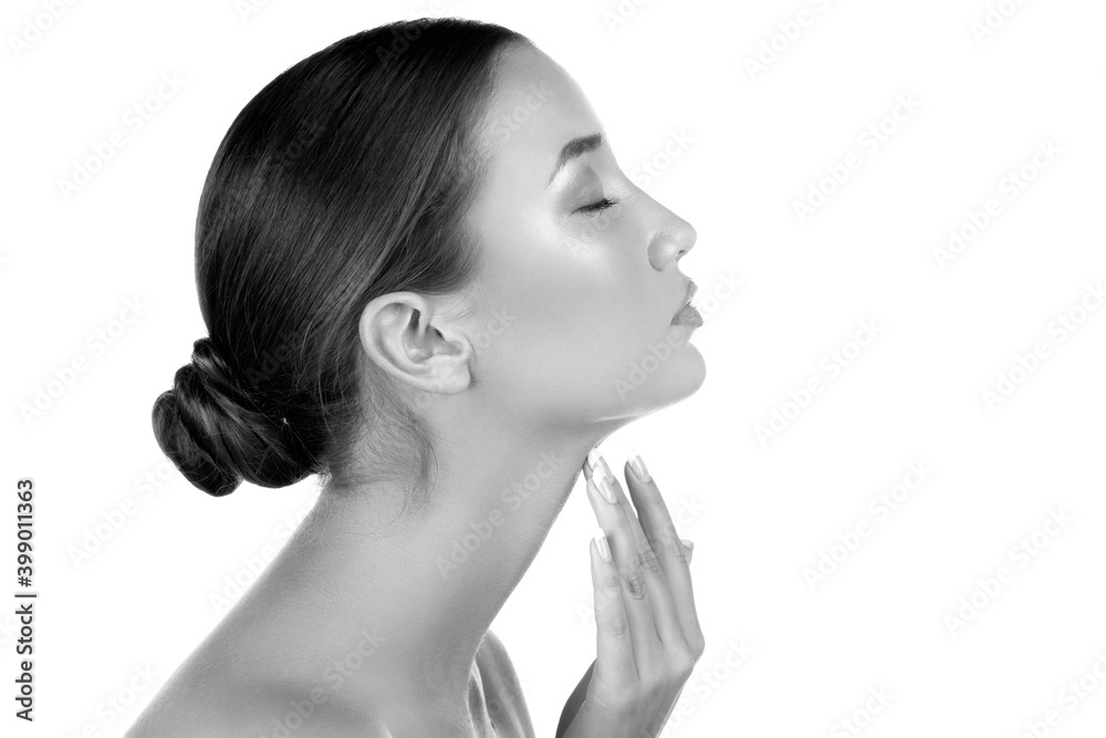 Pretty woman touching her neck, isolated on white background Pretty woman touching her neck, isolated on white background