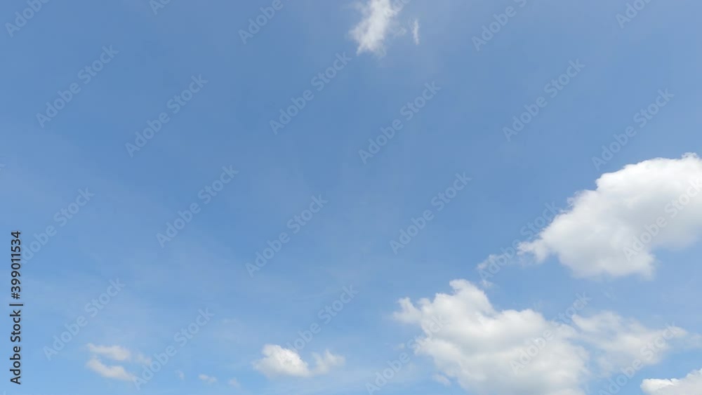 Fluffy puffy white cirrus or cirrostratus white cloud n cumulus cloudscape on beautiful sunny clear blue sky background in tropical summer or spring sunlight n sunray, 4k cinemagraphs b-roll TimeLapse Fluffy puffy white cirrus or cirrostratus white cloud n cumulus cloudscape on beautiful sunny clear blue sky background in tropical summer or spring sunlight n sunray, 4k cinemagraphs b-roll TimeLapse