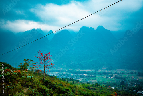  road in the mountains with blue sky on the background at Ha Giang province, Viet Nam