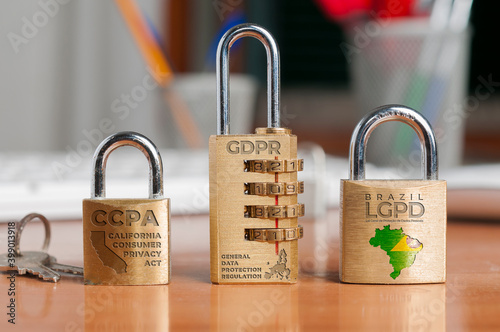 Data protection laws concept: three locks shows the names of three data protection laws: california consumer privacy act, general data protection regulation and lei geral de proteção de dados pessoais photo
