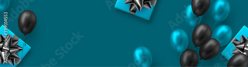 Glossy balloons in blue and black colors with gift box. Vector balloons background for holidays or birthday party. Copy space, blue background.