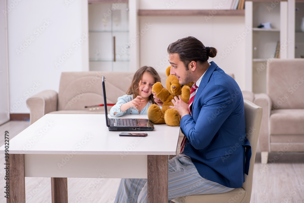 Girl bothering young father during working from house in pandemi Girl bothering young father during working from house in pandemi