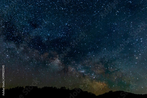 Fototapeta Naklejka Na Ścianę i Meble -  Milky way galaxy behind a mountain