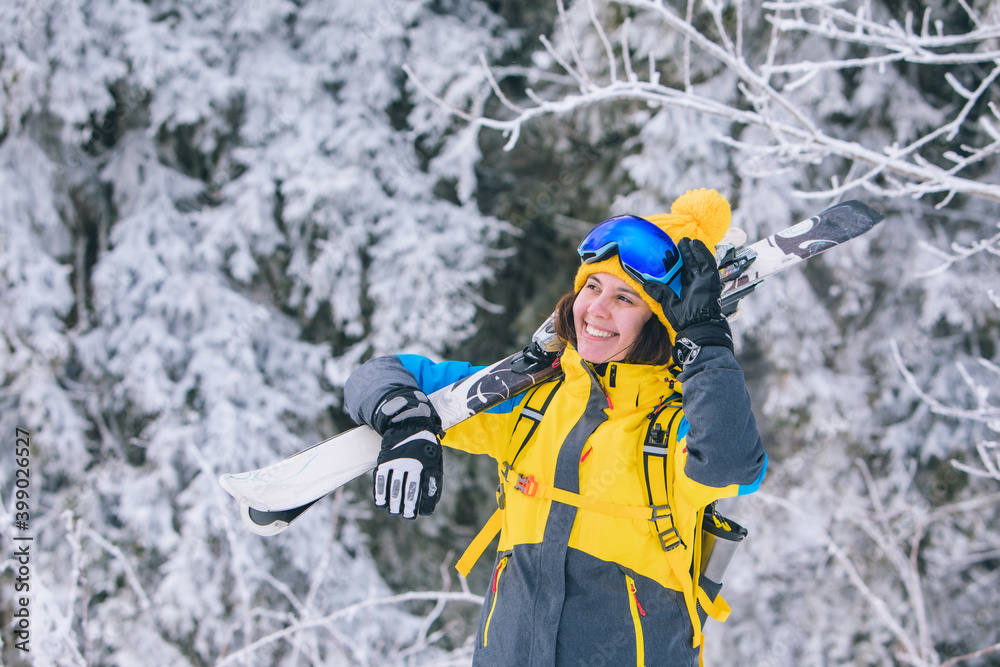 smiling stunning woman portrait in ski outfit