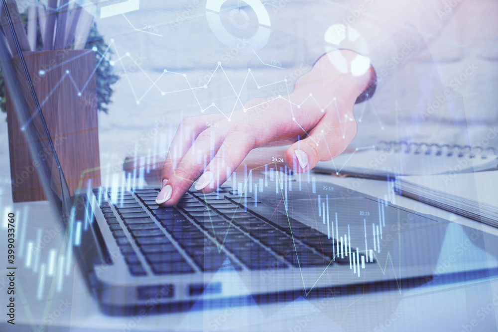 Multi exposure of woman hands typing on computer and forex chart hologram drawing. Stock market analysis concept.