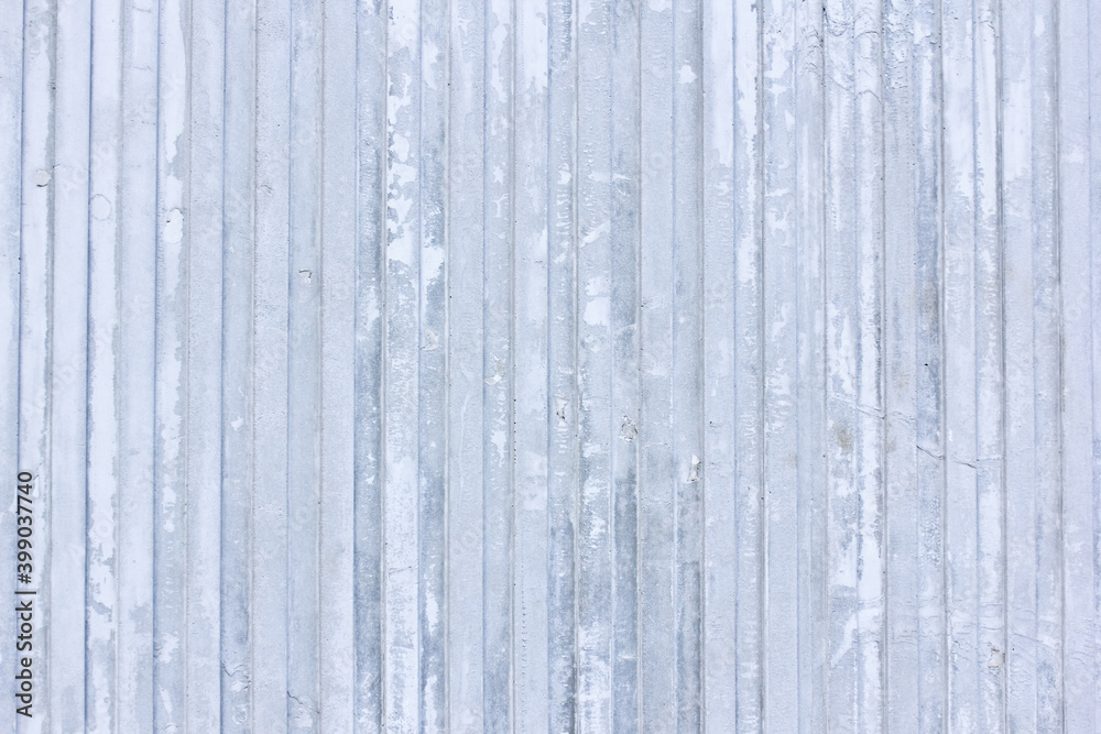 The texture of the old blue striped concrete wall. Part of the construction of a concrete object. Empty background. The texture of the old blue striped concrete wall. Part of the construction of a concrete object. Empty background.