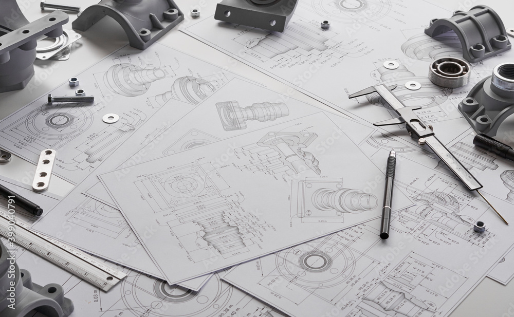 Engineer technician designing drawings mechanical parts engineering ...