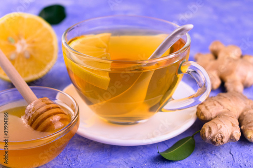  A cup of healthy ginger tea with lemon and honey. Close-up.