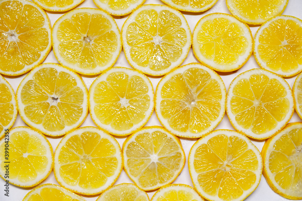 Abstract photo of a yellow lemon fruit, top down.