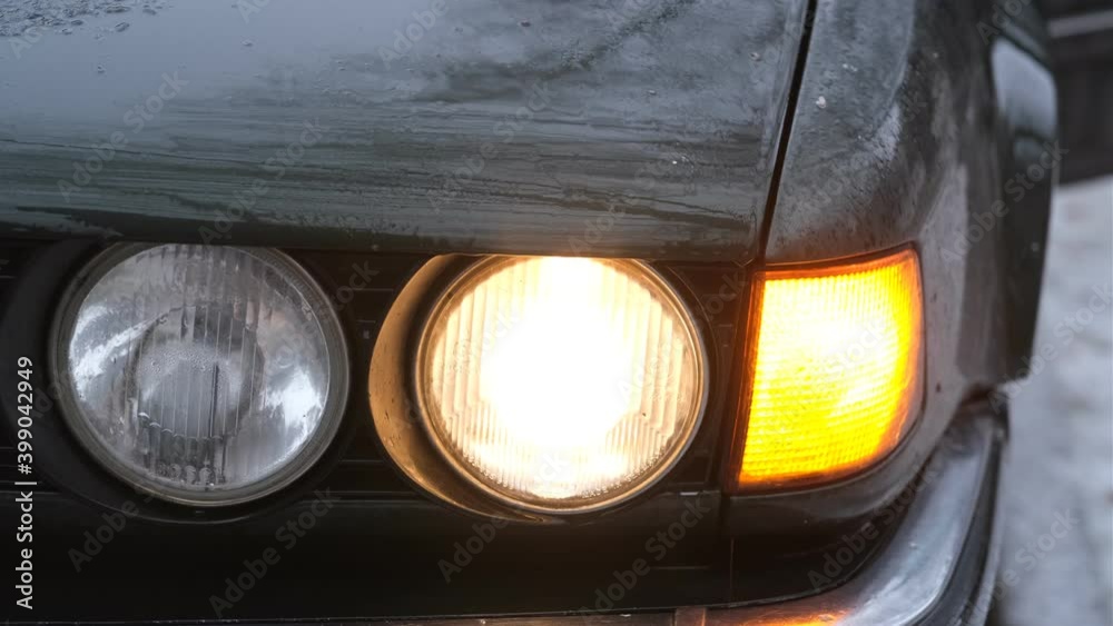 close up element of car headlight, flashing turn signal close up element of car headlight, flashing turn signal