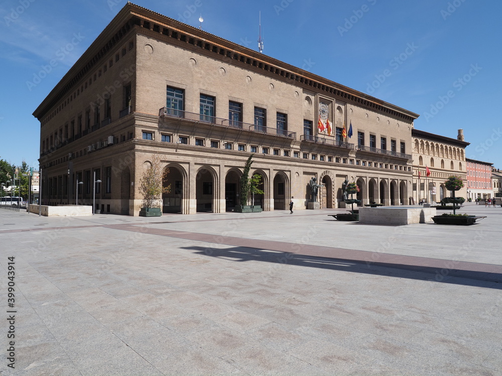 View to town hall on main market square in european Saragossa city at Aragon district in Spain, clear blue sky in 2019 warm sunny summer day on September.