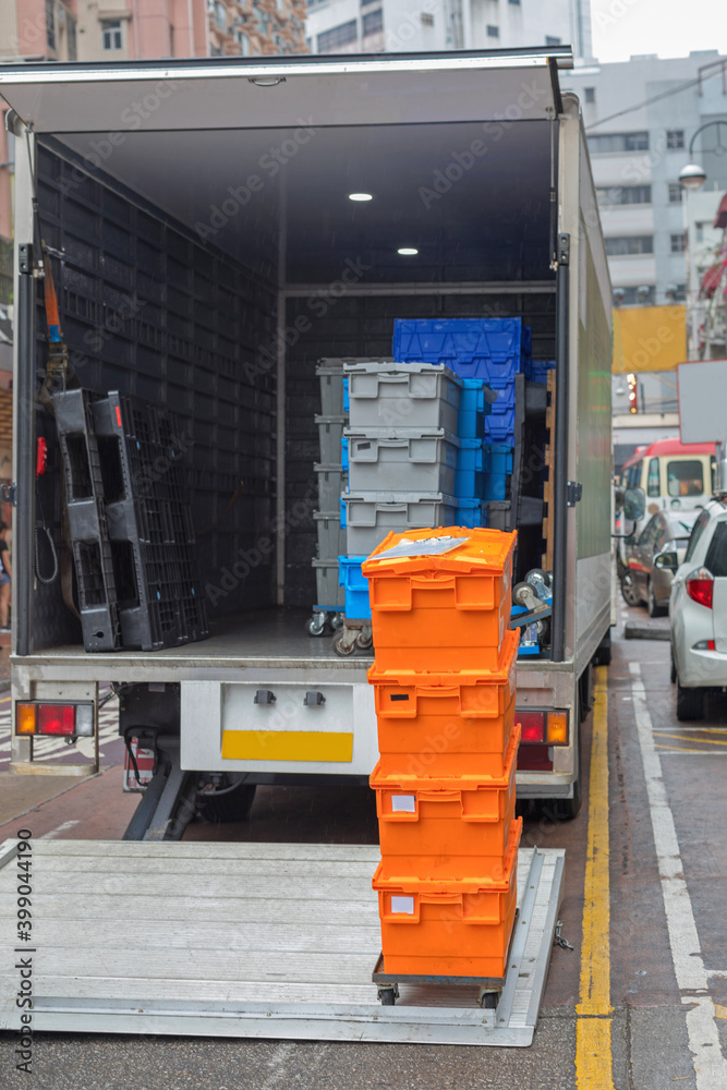 Naklejka premium Stacked Boxes Cart Truck