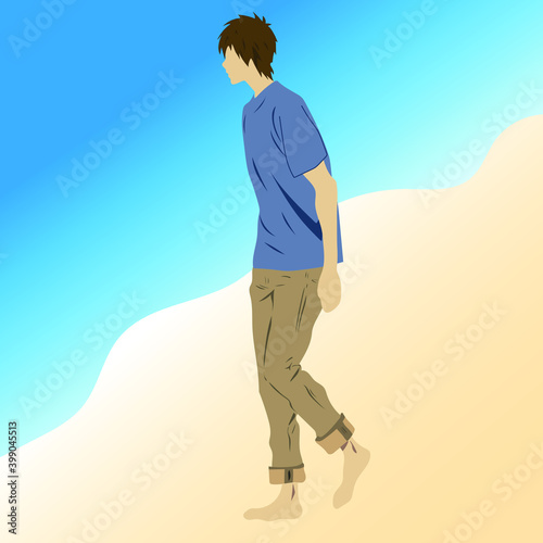 A man with a blue t-shirt and brown trousers walking on the beach by the sea