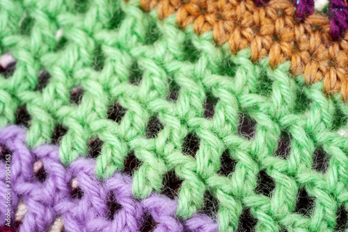 Multi colored wool thread yarn background texture. Wool pattern
