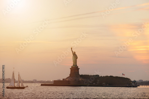 City skyline at sunset. USA. Statue of Liberty National Monument © aletia2011