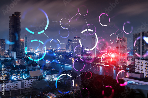 Abstract technology icons, night aerial panoramic cityscape of Bangkok, Asia. The concept of innovative approach to optimize international business process. Double exposure.