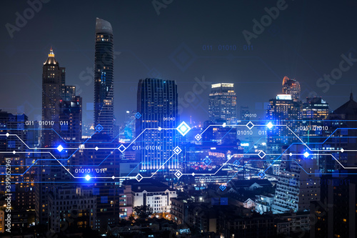 Information flow hologram, night panorama city view of Bangkok. The largest technological center in Asia. The concept of programming science. Double exposure.