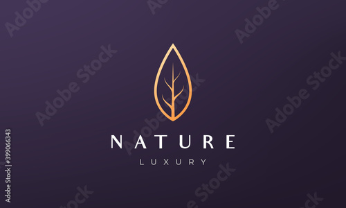 simple gold tree logo in luxurious and modern style