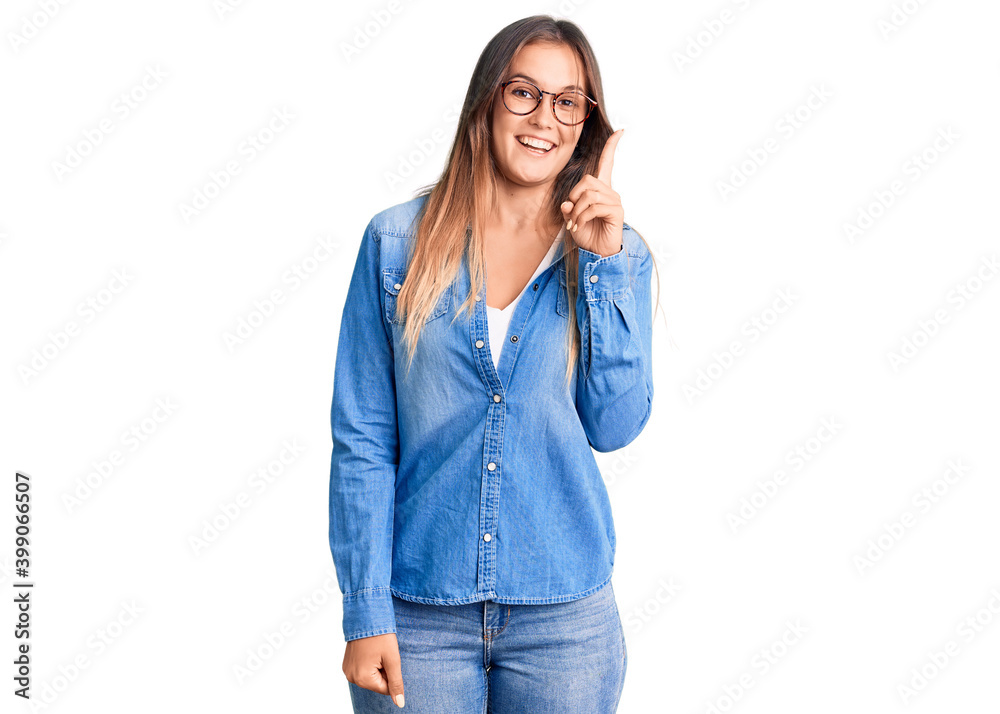 Fototapeta premium Beautiful caucasian woman wearing casual clothes and glasses with hand on head, headache because stress. suffering migraine.