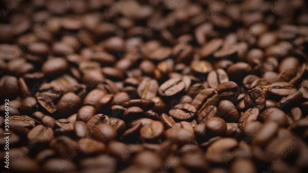 fresh roasted coffee beans background (looping)