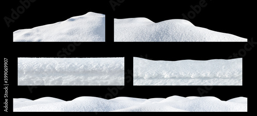 Snow drifts on an isolated black background. Winter elements for design.
