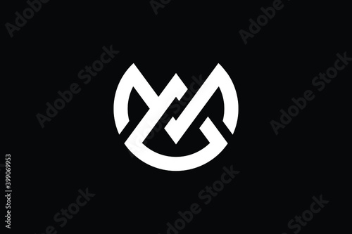 MG logo letter design on luxury background. GM logo monogram initials letter concept. MG icon logo design. GM elegant and Professional letter icon design on black background. M G GM MG