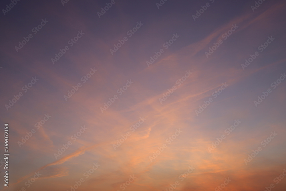 beautiful sky with colored clouds at sunrise