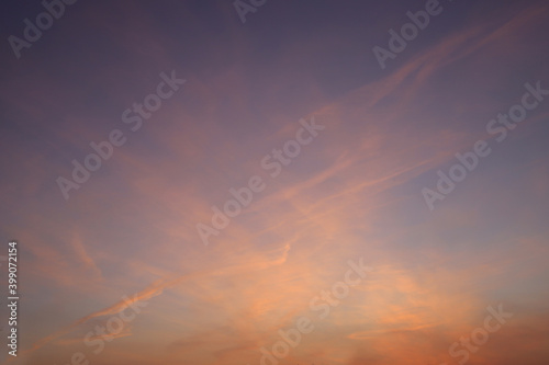 beautiful sky with colored clouds at sunrise