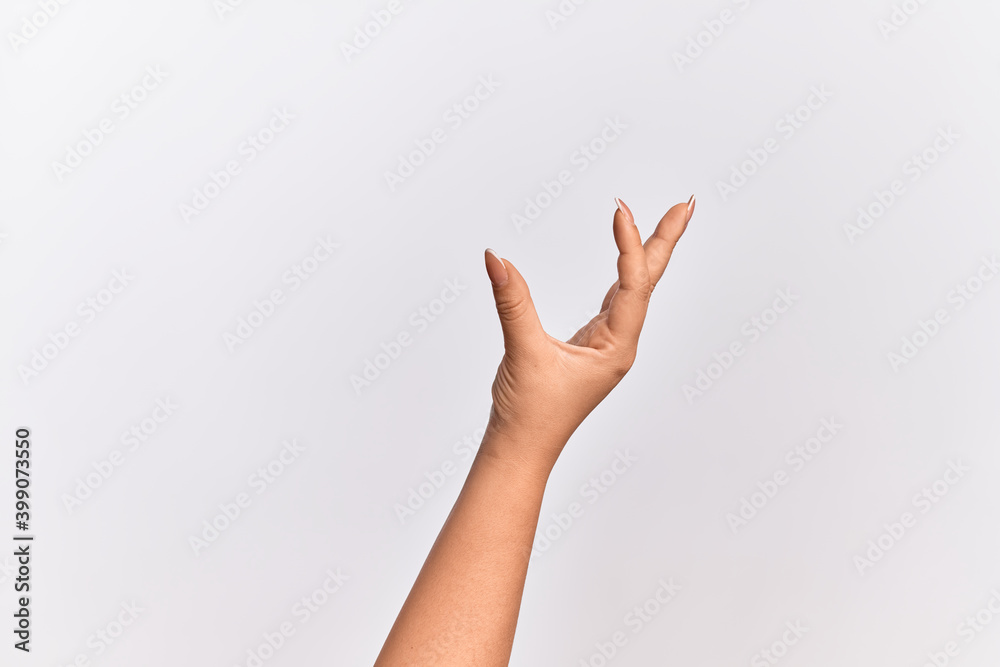Hand of caucasian young woman picking and taking invisible thing, holding object with fingers showing space Hand of caucasian young woman picking and taking invisible thing, holding object with fingers showing space
