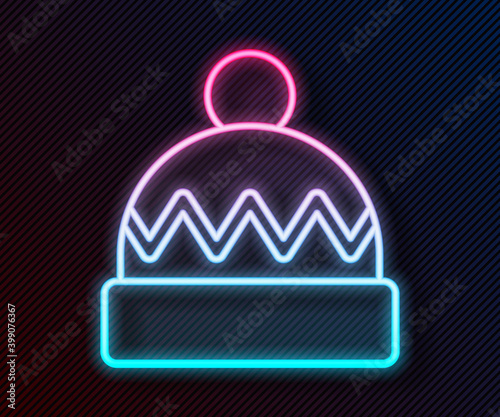 Glowing neon line Winter hat icon isolated on black background. Vector.