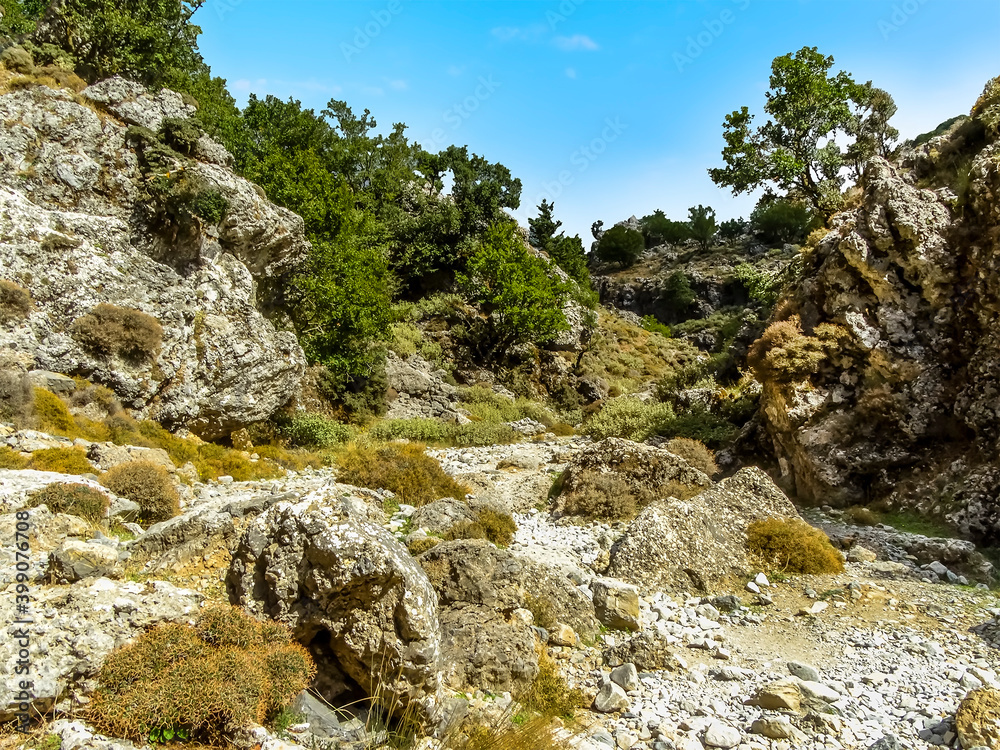 The uneven path of the Imbros Gorge near Chania, Crete on a bright sunny day