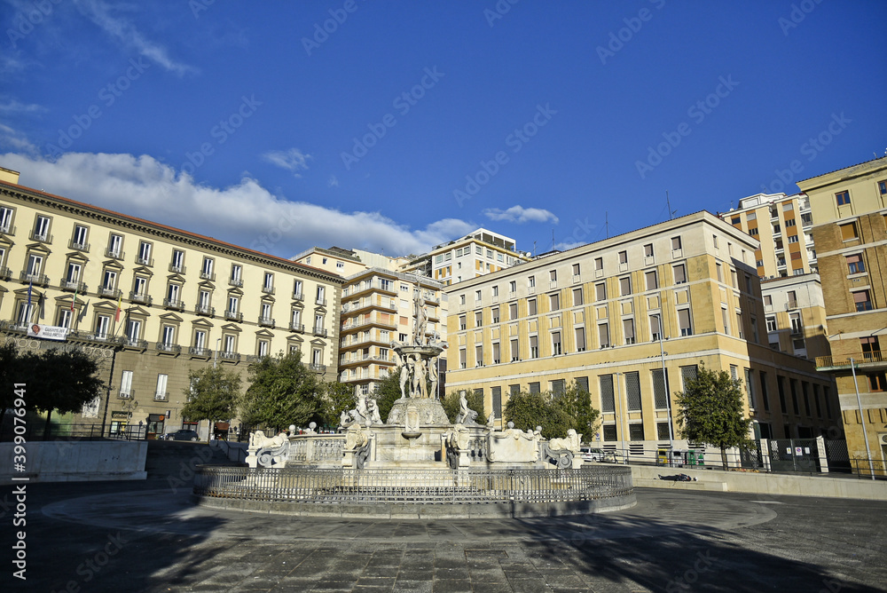 Naples, Italy, December 13, 2020. A 17th century fountain in front of the town hall.