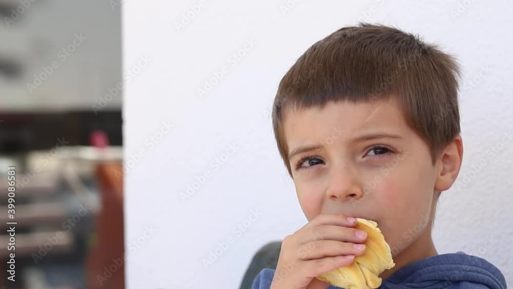 boy eating bread