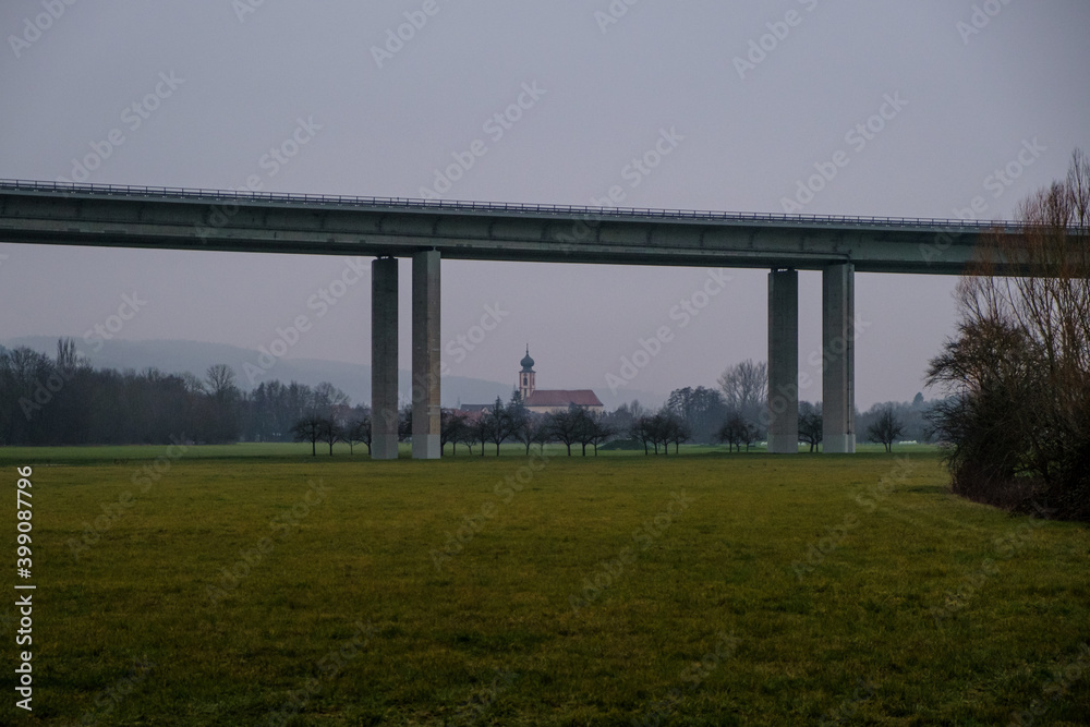 Town with Church under the Bridge from a Autobahn in Germany. Town with Church under the Bridge from a Autobahn in Germany.